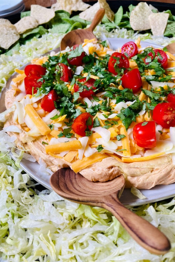 best taco dip with wood scoop