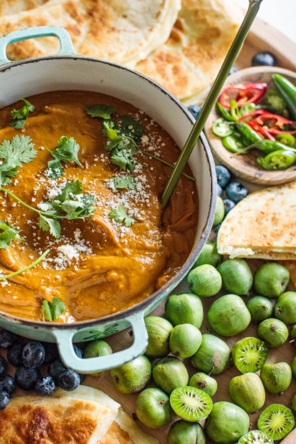 sweet potato soup with ladle