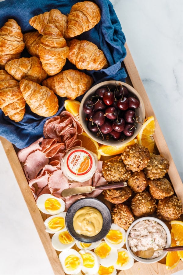 Croissant Breakfast Sandwich Board with cherries
