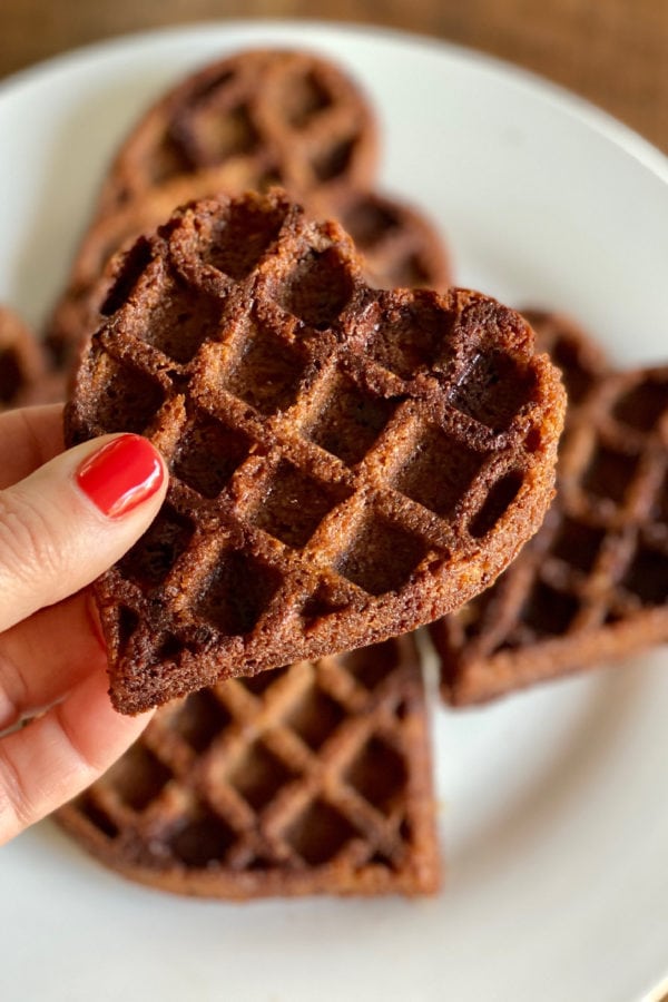 holding a Heart-Shaped Waffle Cookie