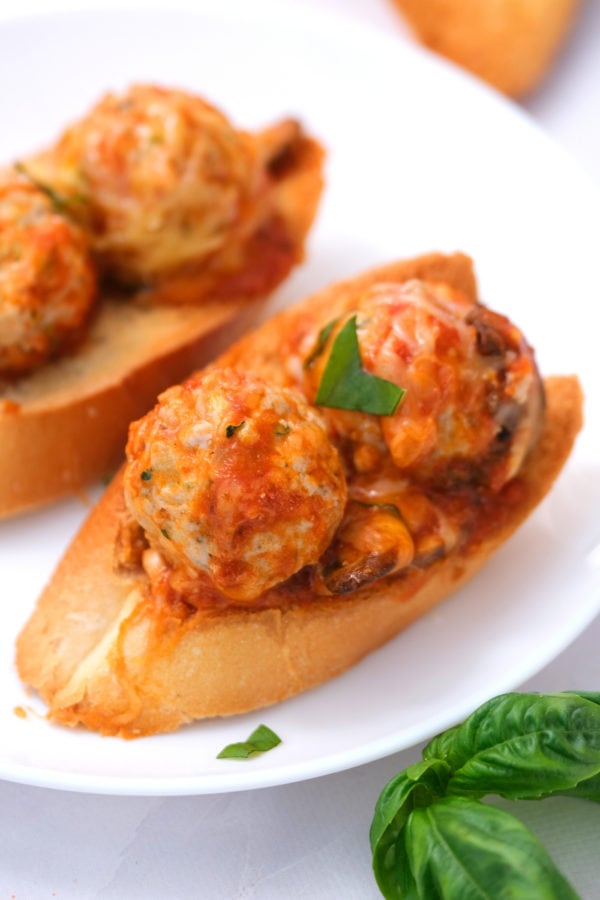 Skillet Cheesy Meatball Dip on crostini