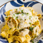 blue bowl of Creamy Lemon Chicken Pasta