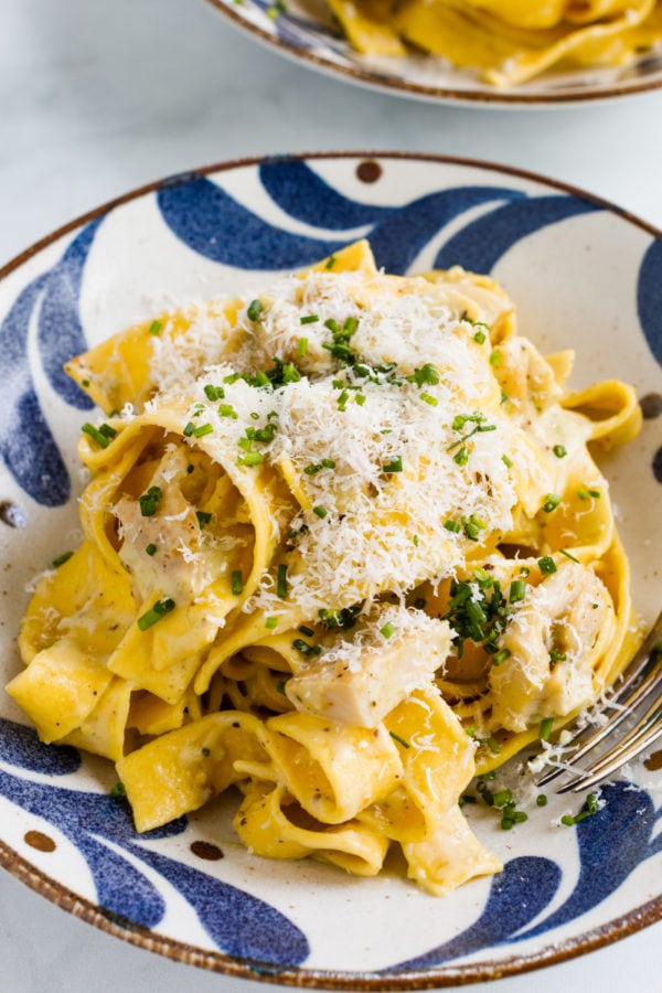 blue bowl of Creamy Lemon Chicken Pasta