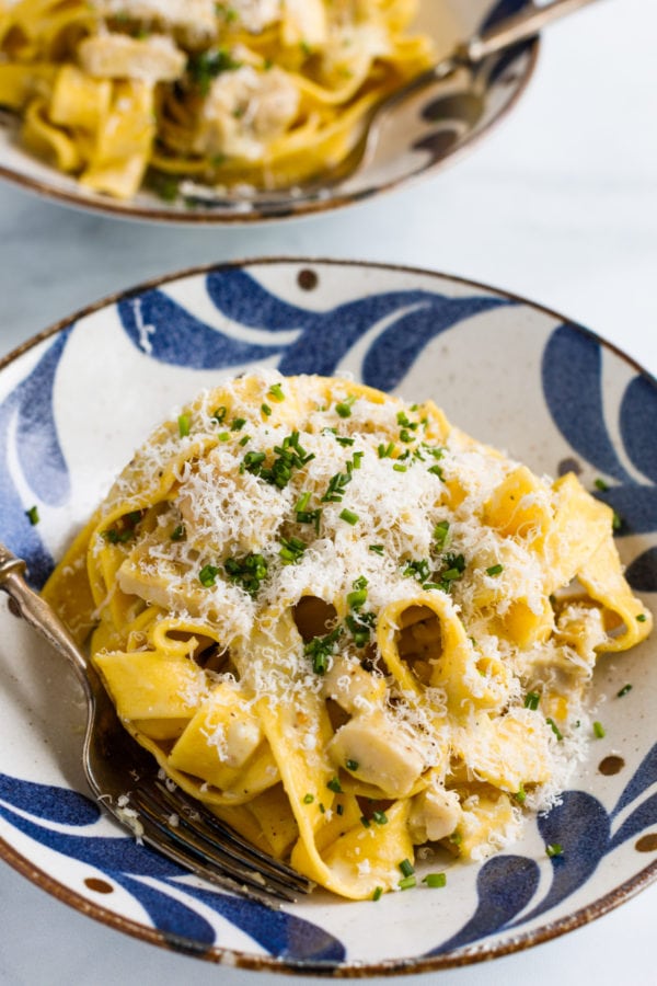 serving of Creamy Lemon Chicken Pasta in a blue bowl