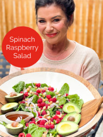 woman holding a Spinach Raspberry Salad