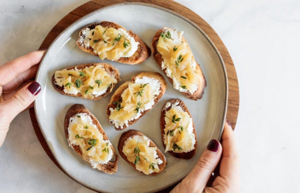 a serving of bite of Caramelized Onion Crostini