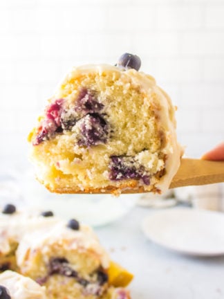 a slice of Lemon Blueberry Bundt Cake