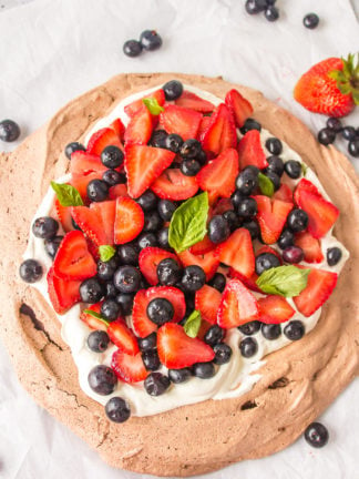 Strawberry Blueberry Chocolate Pavlova with cream