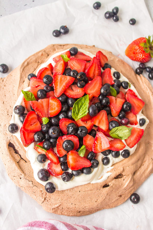 Strawberry Blueberry Chocolate Pavlova with cream