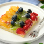 serving with fork of fruit pizza