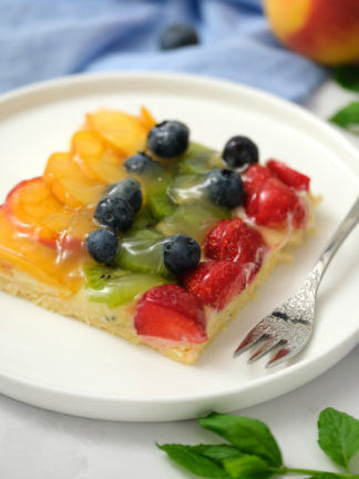 serving with fork of fruit pizza