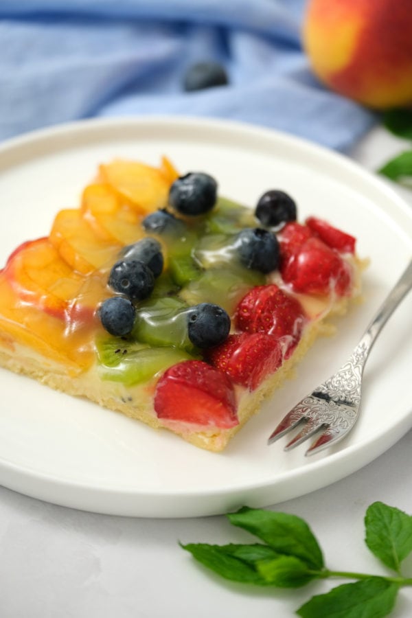 serving with fork of fruit pizza