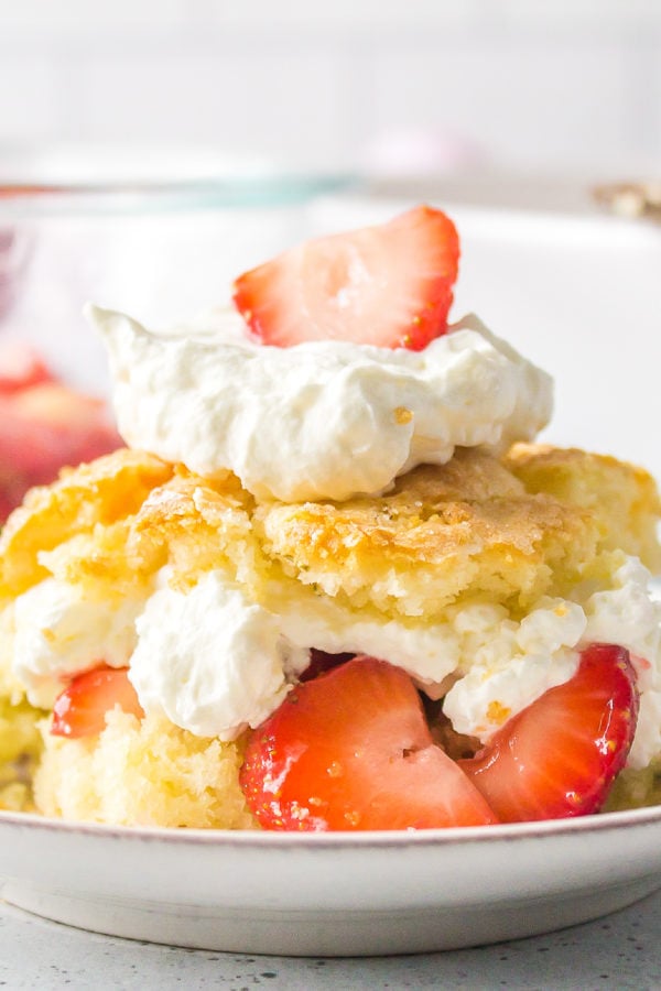 whipped cream and Cake Pan Rosemary Strawberry Shortcake