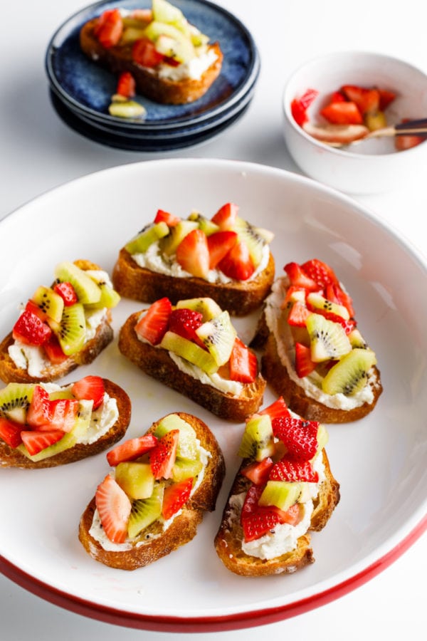 white plate of Strawberry Kiwi Crostini Bites