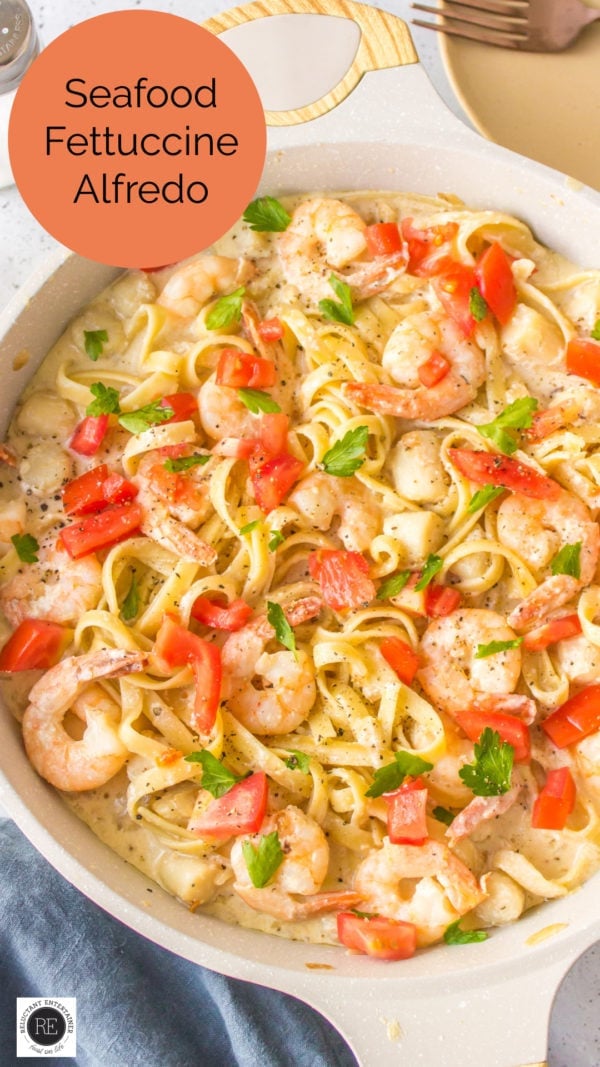 Seafood Fettuccine Alfredo with shrimp and tomatoes