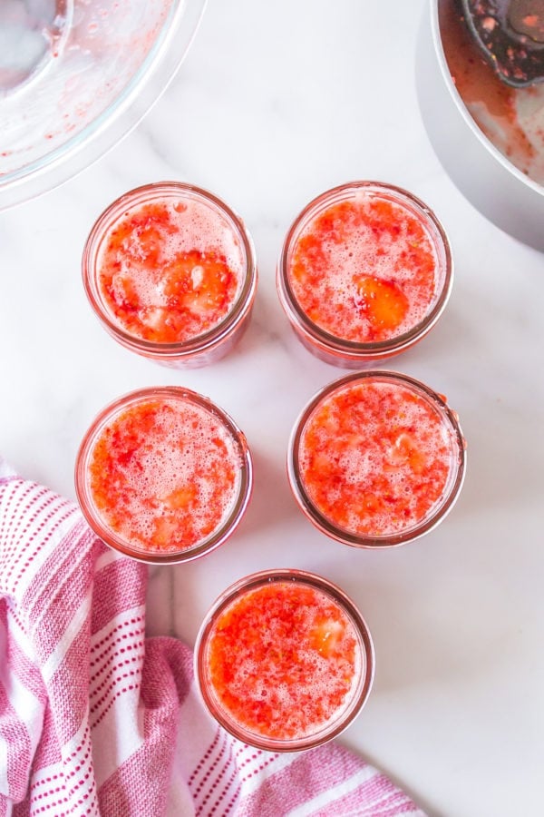 making jars of homemade jam