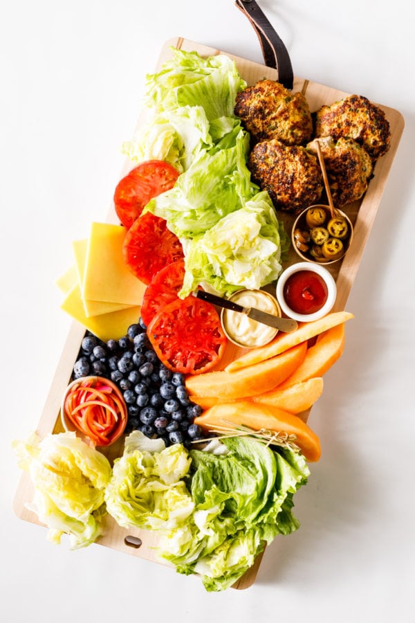 burger board with fruit