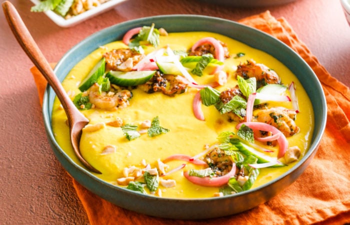 a bowl of Chilled Corn Soup with Garlic shrimp