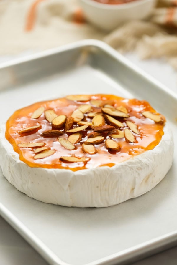 peach jam and almonds on brie