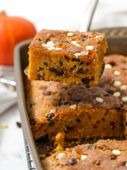 cutting a piecec of pumpkin cake