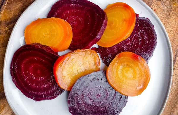 sliced yellow and red beets