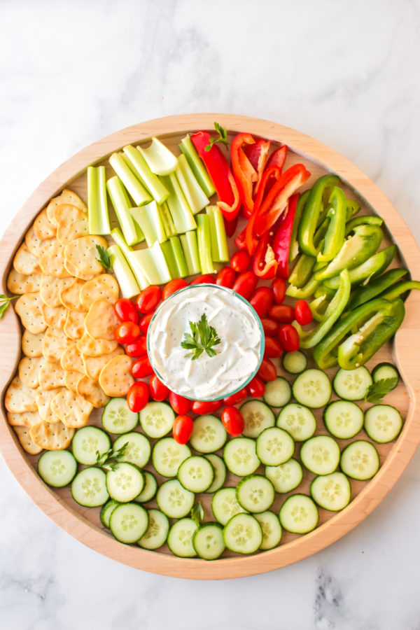 big board with veggies and dip