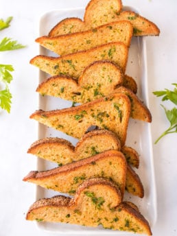 sliced garlic bread on plate