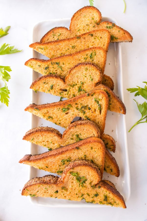 sliced garlic bread on plate