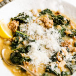 White Bean and Kale Soup with slice of lemon