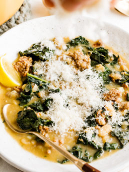 White Bean and Kale Soup with slice of lemon