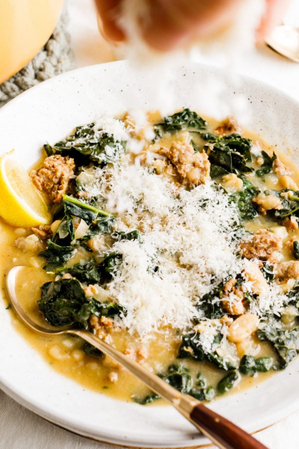 White Bean and Kale Soup with slice of lemon