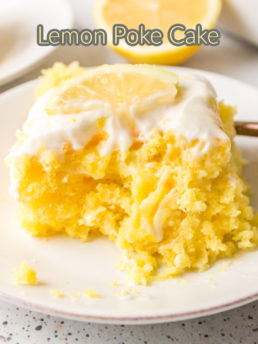 a lemon slice on top of lemon cake