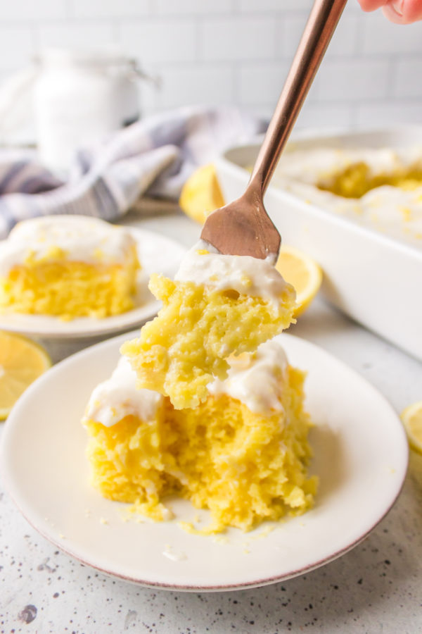 taking a bite of cake with lemon pudding