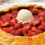 a round Strawberry Galette with cream