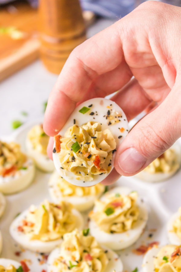 a bite of Breakfast Deviled Eggs