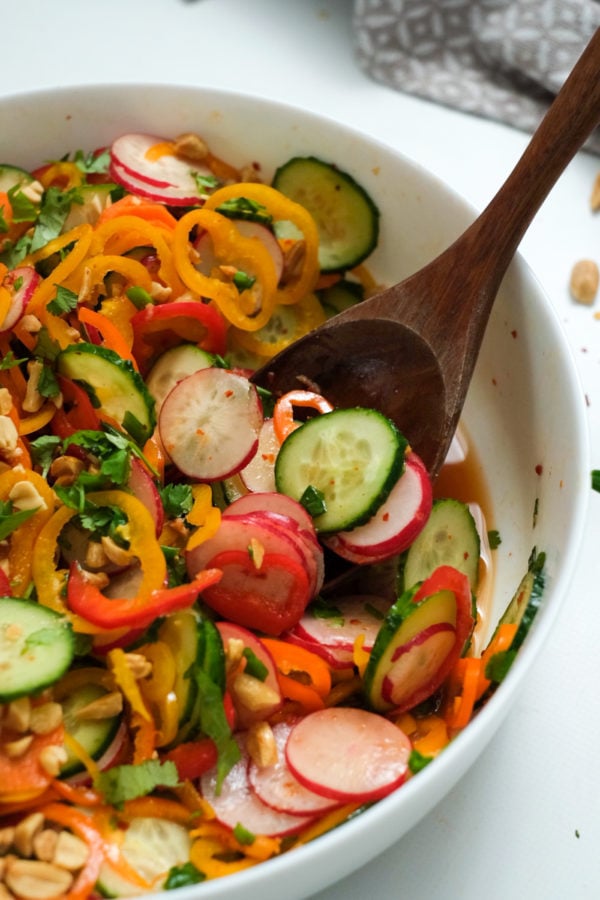 mixing a Thai Cucumber Carrot Salad