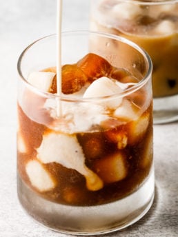 making an iced coffee drink with oat cubes