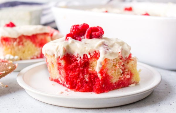 a bite of Raspberry Poke Cake