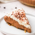 a serving of No-Bake Chocolate Mousse Pie with shaved chocolate