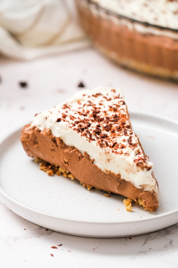 a serving of No-Bake Chocolate Mousse Pie with shaved chocolate