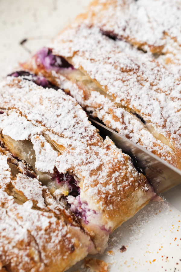 cutting a Blueberry Strudel