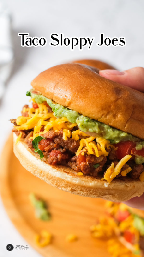 a taco burger with grated cheese