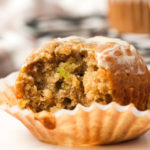taking a bite of Zucchini-Banana Muffin