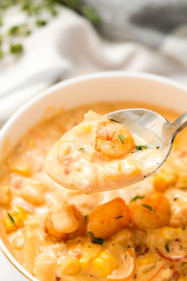 taking a bite of shrimp bisque