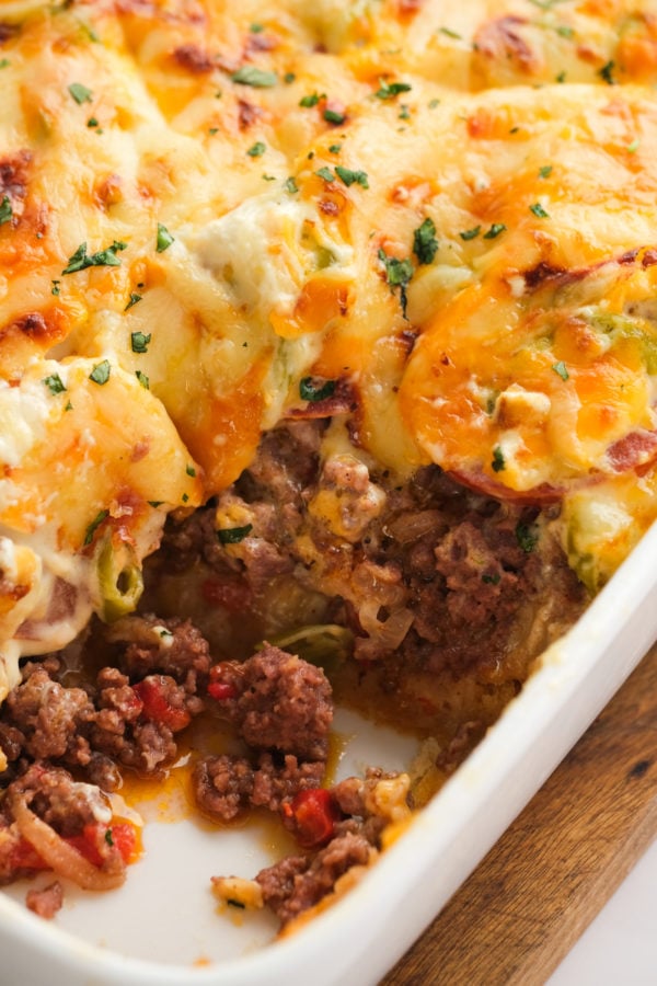 serving a meaty, cheesy casserole