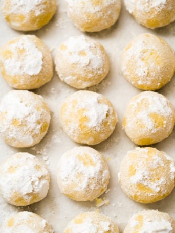 snowball cookies rolled in powdered sugar