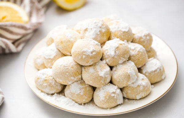 a plate of Powdered Sugar Cookie with lemons