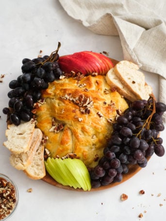 Baked Brie with Fig Jam with fruit and bread