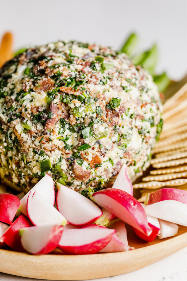 Jalapeno Popper Cheese Ball with herbs and crackers and veggies