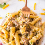fork bite of pasta with meat